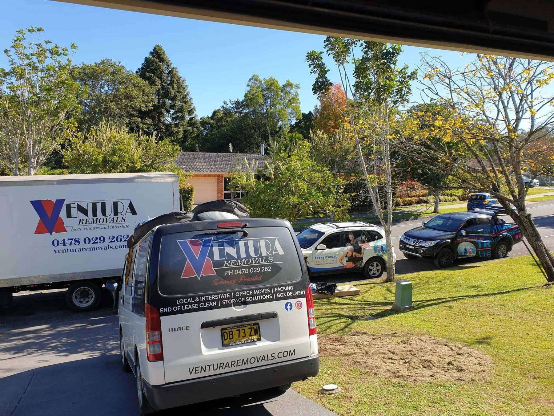 Ventura Removals van and truck parked on a Central Coast street